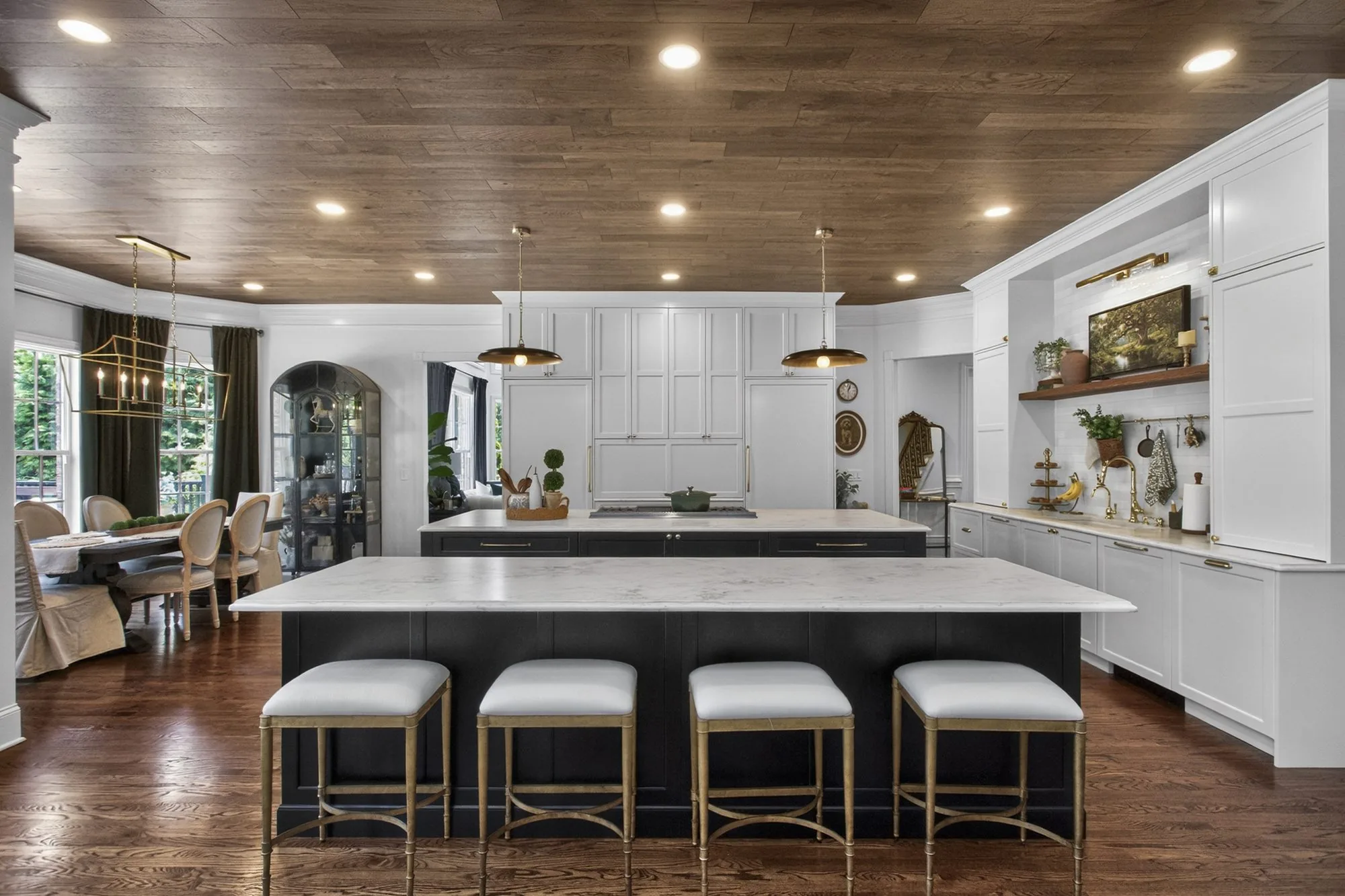 Black and white double island kitchen by Black Mountain Cabinetry